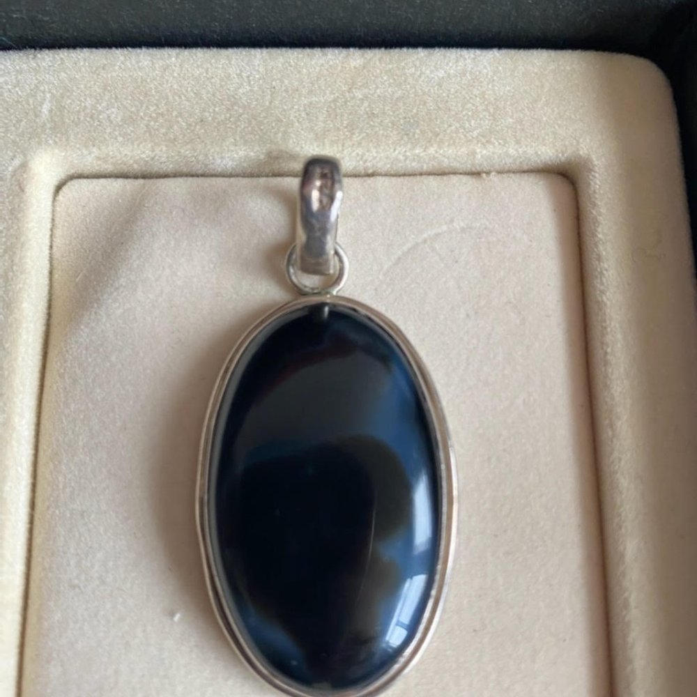 VINTAGE  STERLING  SILVER  & STONE  PENDANT .